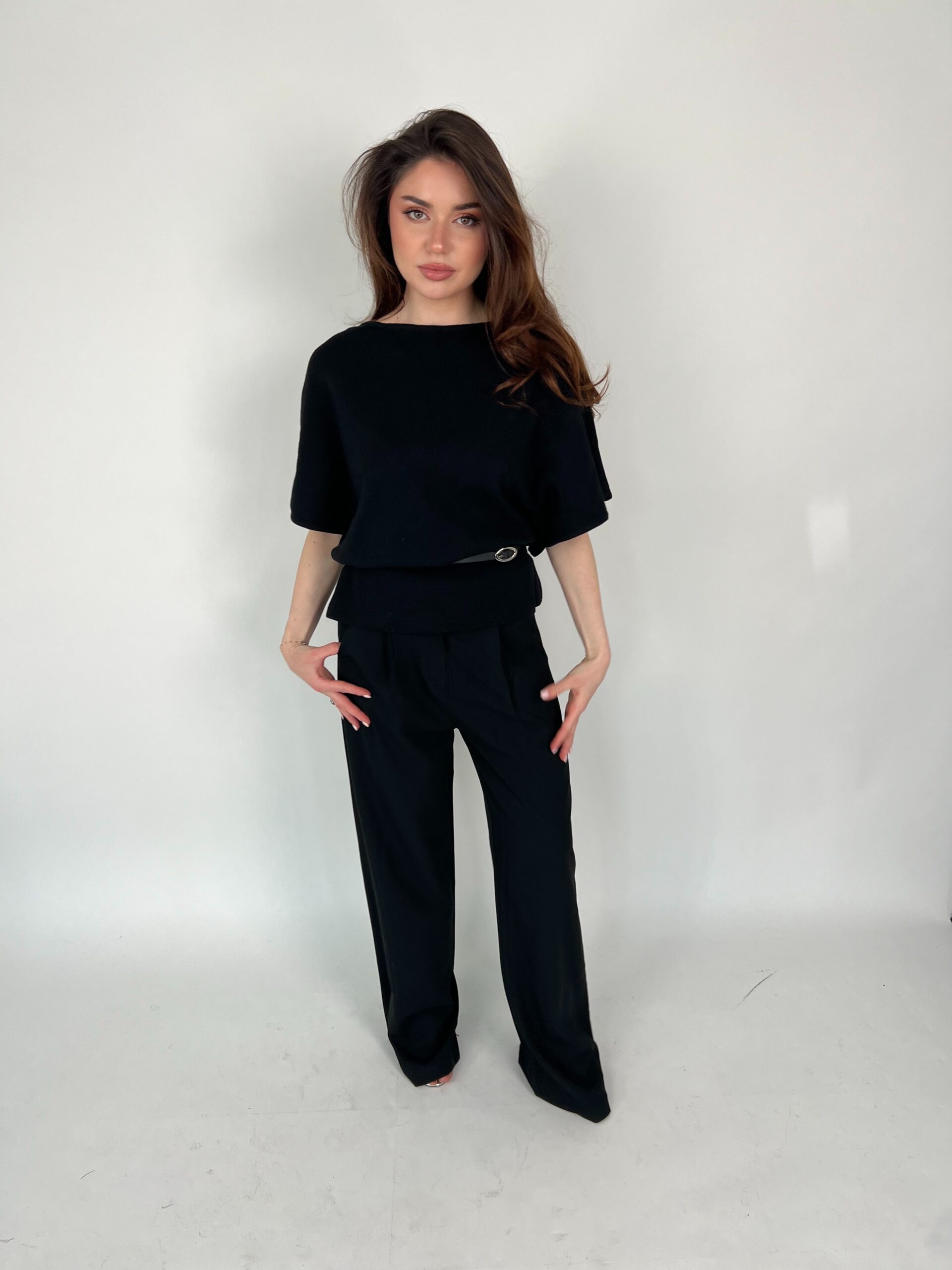 Black belted jumper